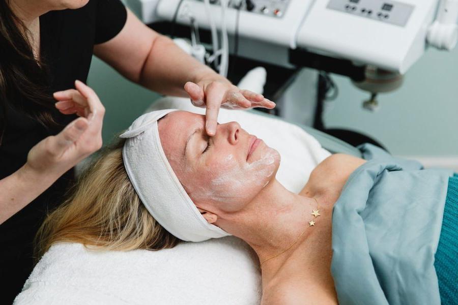 a woman getting a facial